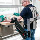 Illustration for article titled This Exoskeleton Rig Makes Factory Workers 10 Times Stronger